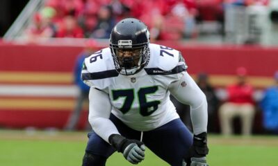 Should the Bears sign a veteran offensive tackle to compete with Teven Jenkins and Larry Borom? (2022 Season)